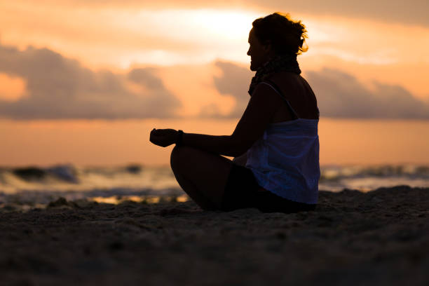 istock Enjoying the sunset on the seashore 970819144