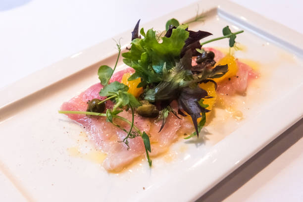 istock Fish Carpaccio of yellowtail with salad 970821662