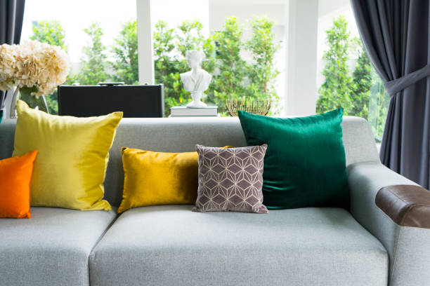 istock living room with grey sofa and colorful pillows 970822886