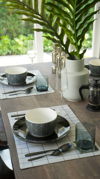 istock plate setting on wooden dining table at home 970823044