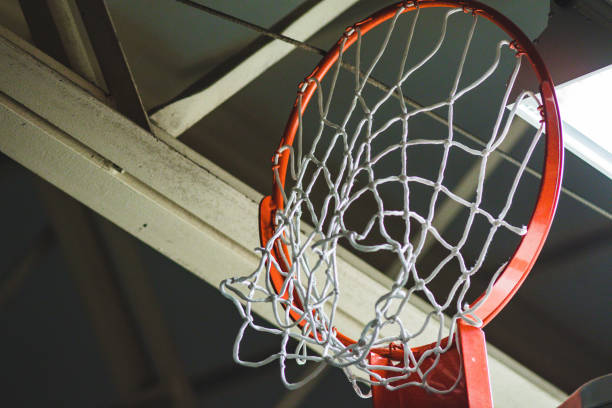 istock basketball hoop and net retracted up for storage 970826654