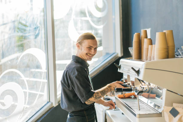 istock Barista brewing coffee with coffee machine 970828170
