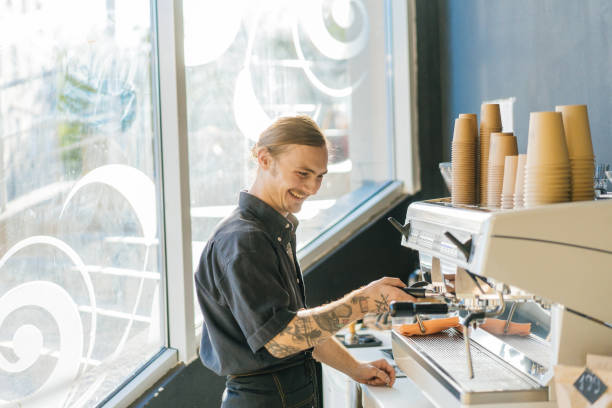 istock Barista brewing coffee with coffee machine 970828332