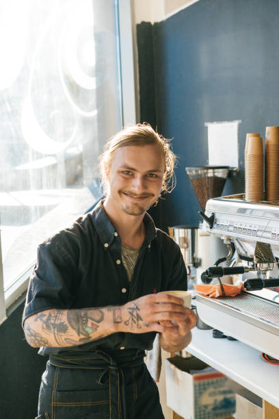 istock Barista brewing coffee with coffee machine 970828944