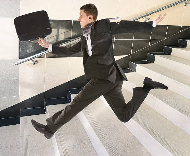 istock Businessman running on stair 97084332