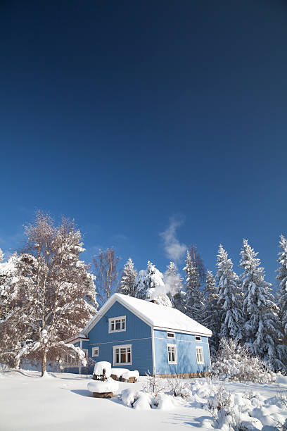 istock Blue sky and house middle of white snow 97084619