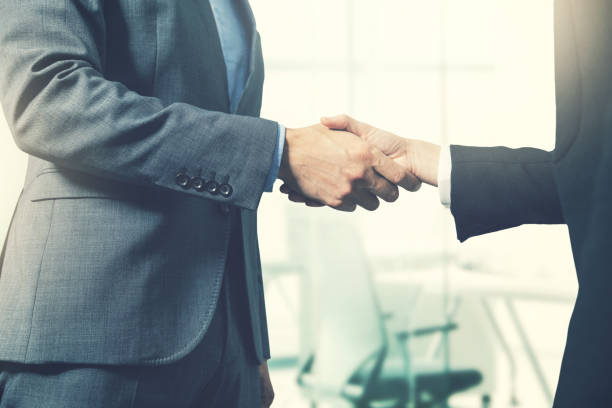 istock business people handshake after successful partnership deal 970849898