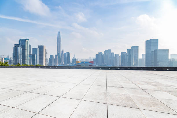 istock Panoramic skyline and modern business office buildings with empty road,empty concrete square floor 970868332