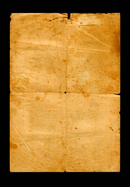 HI RES. Old Folded Paper Black Background. stock photo