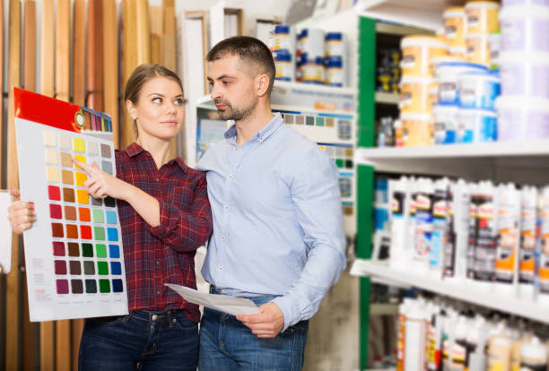 istock Two designer are looking sample of materials for repair 970872118