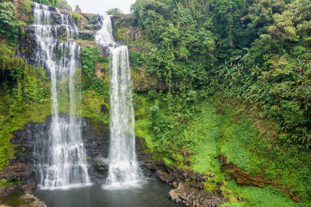 istock streaming line waterfall from high mountain in Laos 970876976