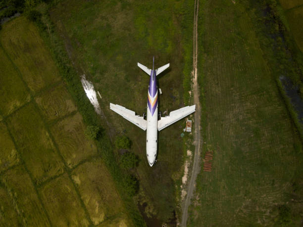 istock Aerial view Airplane on the green field. 970888266