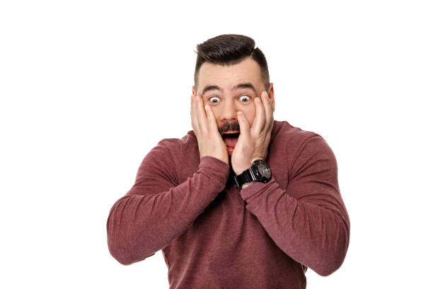 istock bearded football fan screaming on white background. 970891934