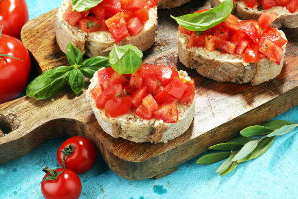 istock fresh tomato bruschetta. italian food appetizer with basil 970895328