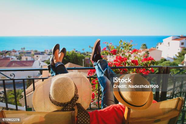 Happy Couple Relax On Balcony Terrace Stock Photo - Download Image Now - Vacations, Spain, Family