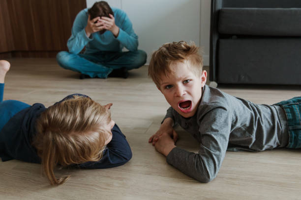 istock angry shouting stressed kids and tired father 970903596