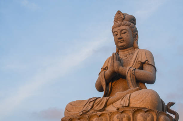 art,asia,asian,background,blue,buddha,buddhist,china,chinese,culture,destination,east,faith,female,god,goddess,guan,guan shi yin pu sa,guanyin,history,holy,kuan,kuan-yin buddha,kwan,landmark,mercy,old,religion,sculpture,sky,spirituality,statue,stone,symbol,taiwan,temple,travel,white,woman,worship,yin