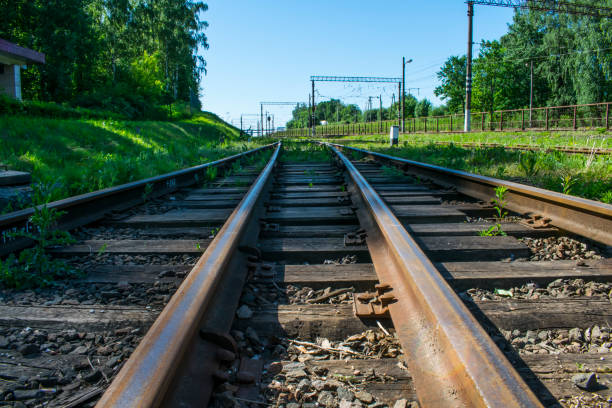 wooden sleepers on the railway in the 20th century - connection merger road togetherness imagens e fotografias de stock