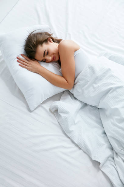 istock Healthy Sleep. Woman Sleeping On White Bedding 970919710