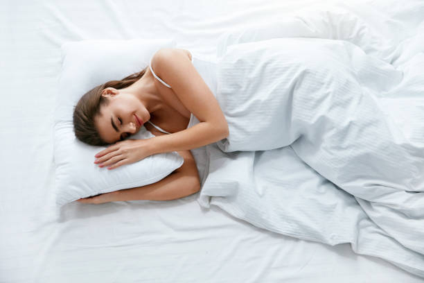 istock Healthy Sleep. Woman Sleeping On White Bedding 970920216