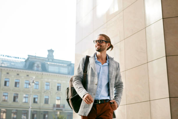 Men Style. Handsome Smiling Man On Street