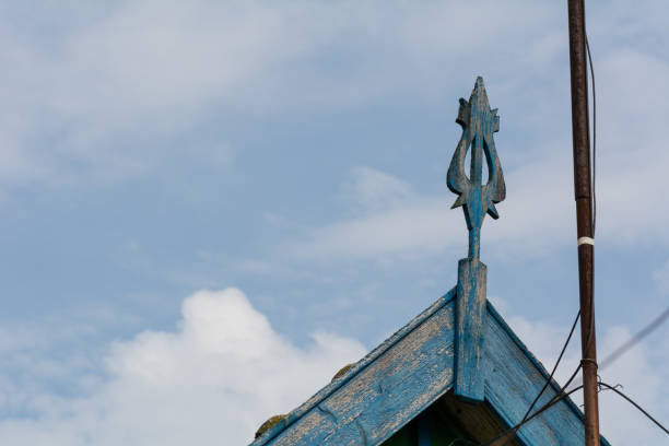 Facade of a rural house, roof decorative element