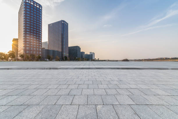 istock Panoramic skyline and modern business office buildings with empty road,empty concrete square floor 970936564