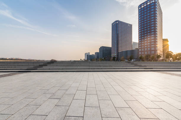 istock Panoramic skyline and modern business office buildings with empty road,empty concrete square floor 970937238