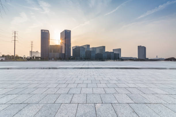 istock Panoramic skyline and modern business office buildings with empty road,empty concrete square floor 970947922