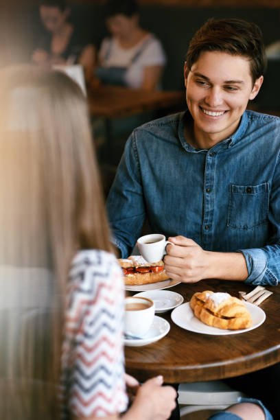 istock Couple With Coffee On Date. Beautiful Smiling People 970951312