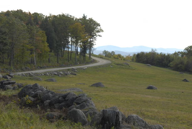 istock Hazy day on New Hampshire back road 970951368