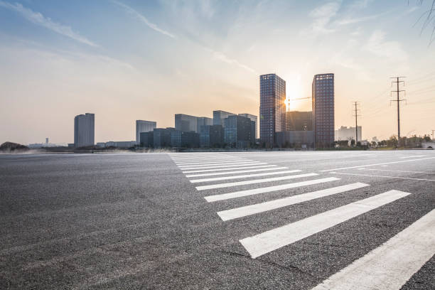 istock Panoramic skyline and modern business office buildings with empty road,empty concrete square floor 970954050
