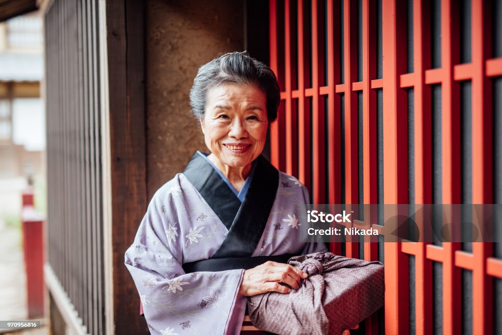 smiling traditional Japanese Senior Woman Old Japanese lady in traditional clothing Japan Stock Photo