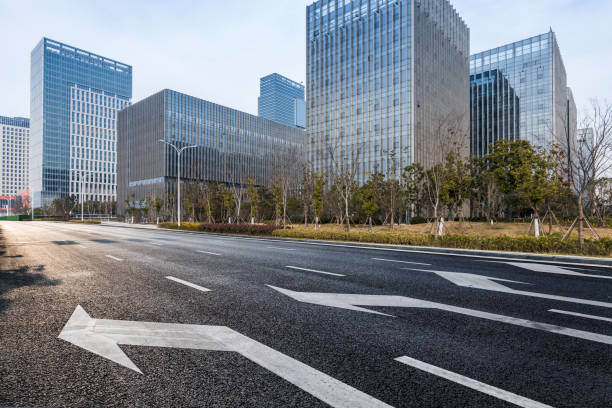 istock Panoramic skyline and modern business office buildings with empty road,empty concrete square floor 970967698