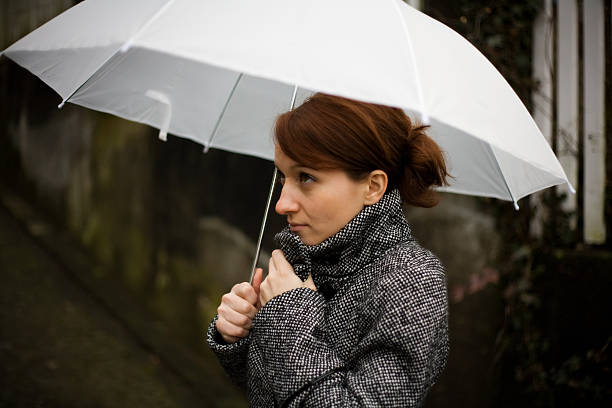 istock Woman with Umbrella 97096856