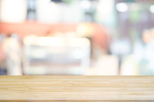 istock Wood table with kitchen room blur background. 970978348