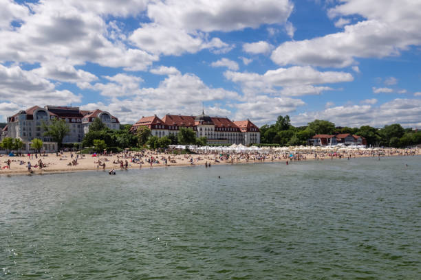 istock Blue sky, clouds, sea and the beach with hotels 970978660