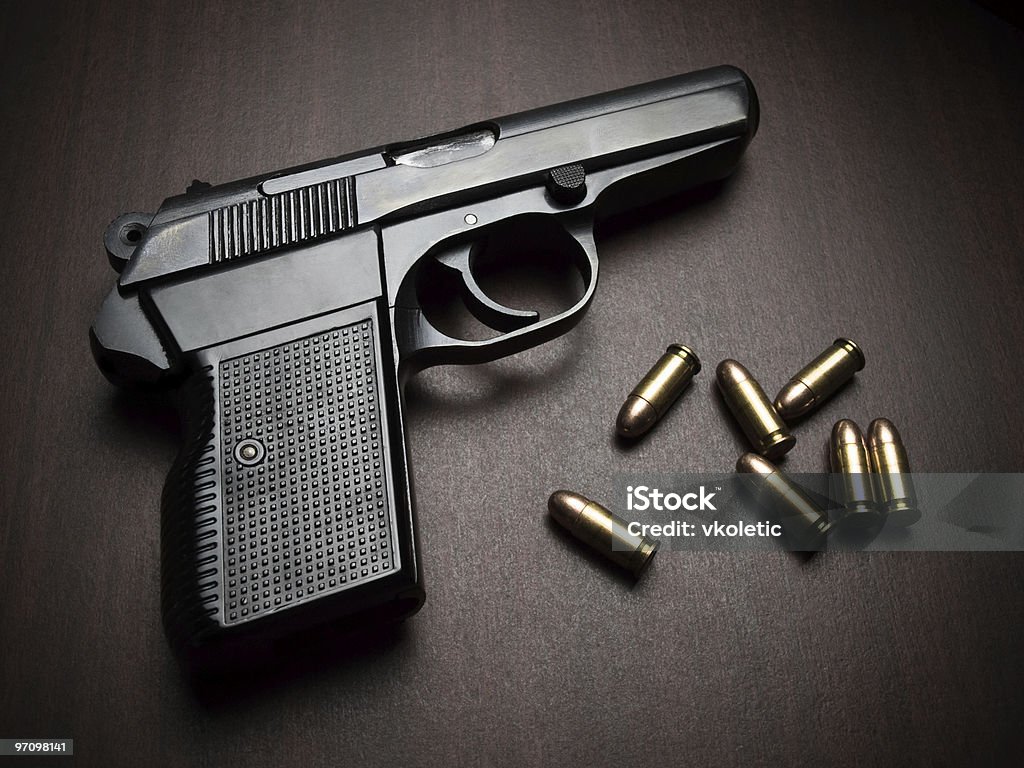 handgun with bullets  Ammunition Stock Photo