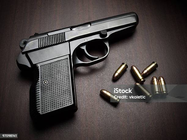 Handgun With Bullets Stock Photo - Download Image Now - Ammunition, Black Color, Brass