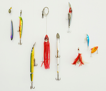 Different Types Of Fishing Lures On A White Wall Stock Photo - Download  Image Now - Activity, Backgrounds, Color Image - iStock