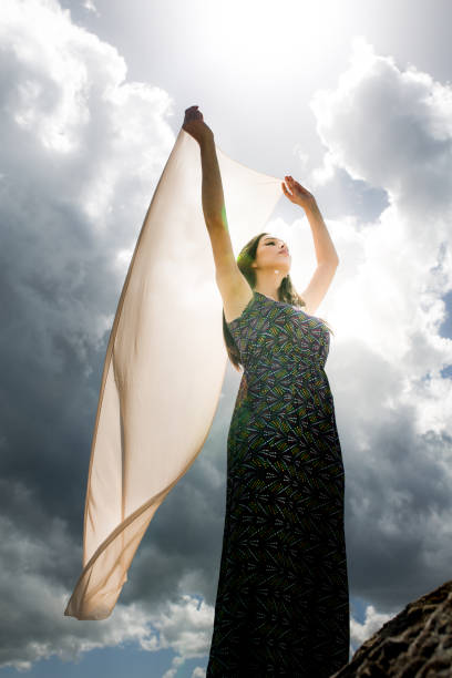 istock a young woman in the spring 970988628