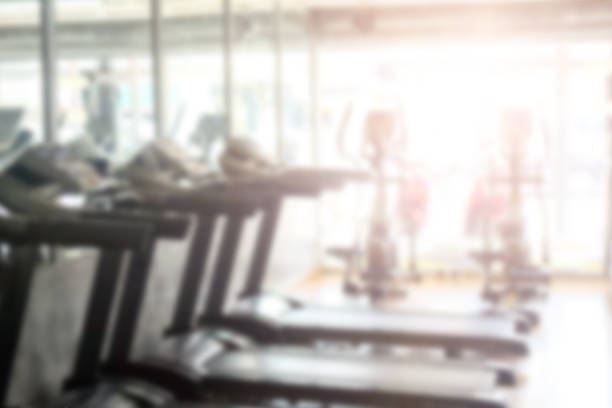 istock Blur fitness room sport training background. 970992496
