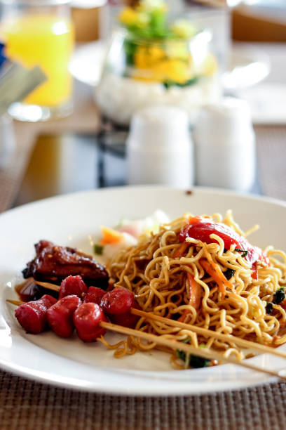 istock A Plate of Delicious Fried Noodle and Sausage 970994808