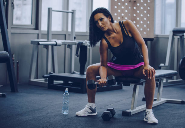 istock Woman workout with dumbbell 970995078