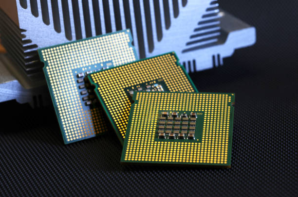 istock closeup of cpu processor on aluminum heat sink cooler 971002088