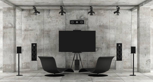 istock Home cinema system in a concrete room 971002128