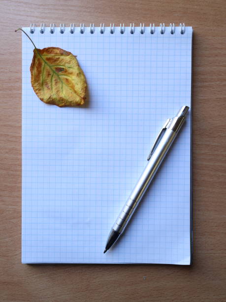 istock notebook and pen, autumn school 971005866