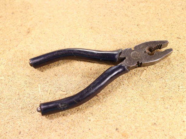 istock pliers and side cutters on the table 971008124