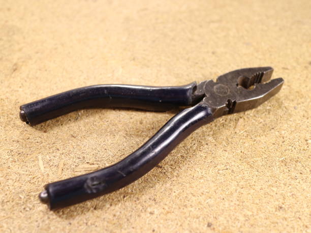 istock pliers and side cutters on the table 971008142