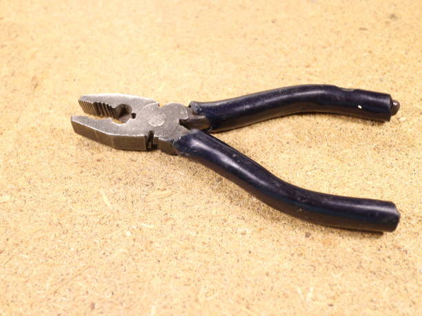 istock pliers and side cutters on the table 971008148